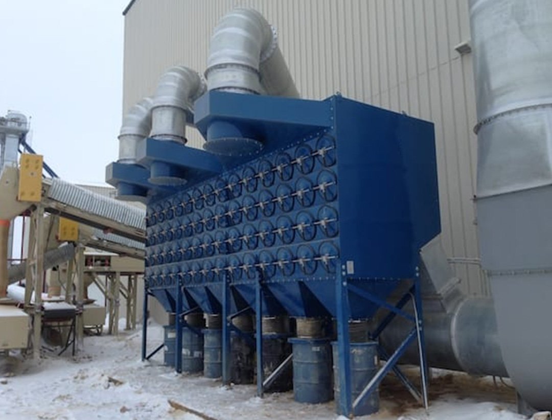 Engineer inspecting dust extraction system